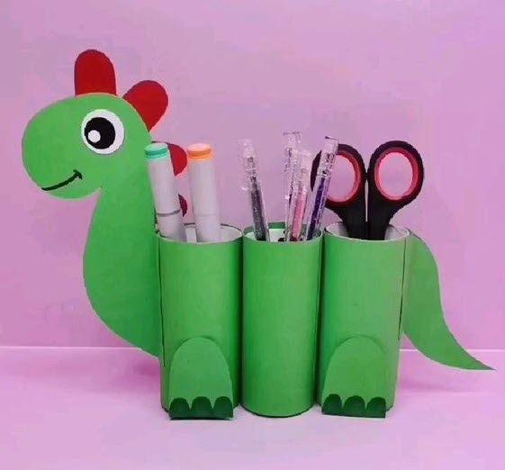 Dinosaur with cardboard rolls