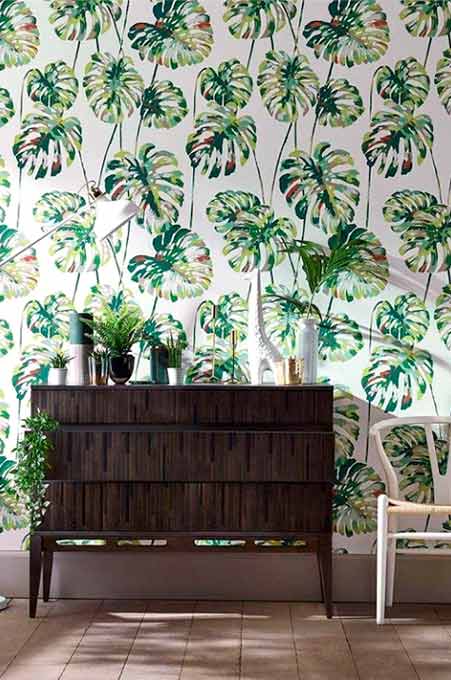 Papier peint avec des feuilles vertes