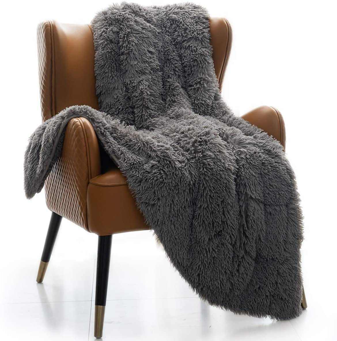 Couverture lestée et décorative de luxe Mr. Sandman en fausse fourrure avec revers pelucheux super chaud en Sherpa sur une chaise
